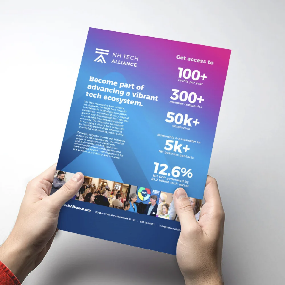 A person holds a creative NH Tech Alliance flyer listing member benefits and statistics on a blue and pink background.