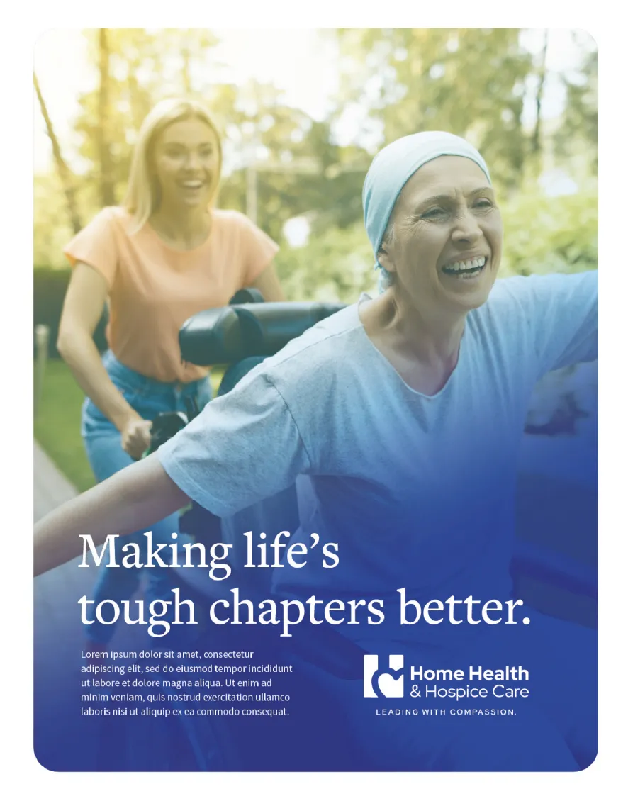 Smiling older woman in a wheelchair outdoors, pushed by a younger woman, enjoying a sunny day.