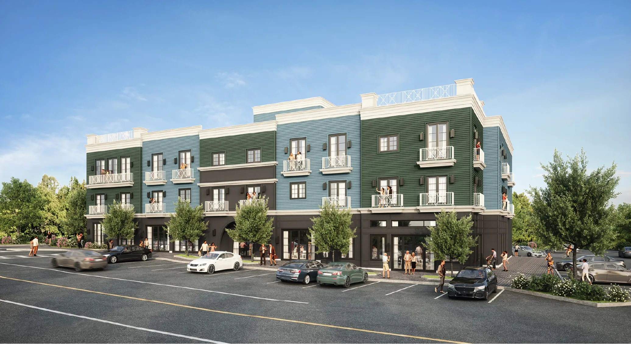 Modern three-story apartment building with balconies, parking lot, cars, and people outside on a sunny day.
